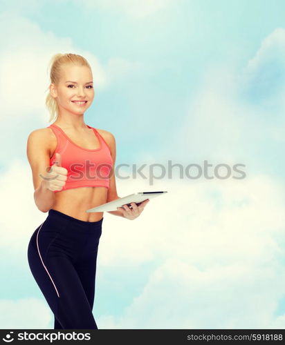 sport, exercise, technology, internet and healthcare - smiling sporty woman with tablet pc computer showing thumbs up