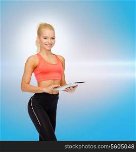 sport, exercise, technology, internet and healthcare - smiling sporty woman with tablet pc computer