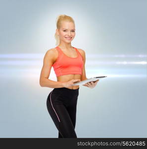 sport, exercise, technology, internet and healthcare - smiling sporty woman with tablet pc computer