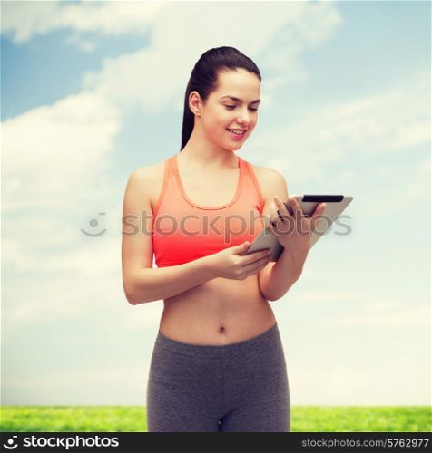 sport, exercise, technology, internet and healthcare - sporty woman with tablet pc computer