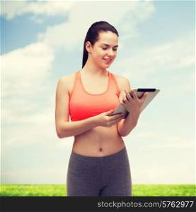 sport, exercise, technology, internet and healthcare - sporty woman with tablet pc computer