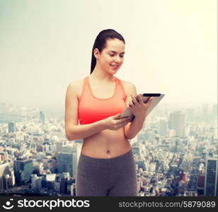 sport, exercise, technology, internet and healthcare - sporty woman with tablet pc computer