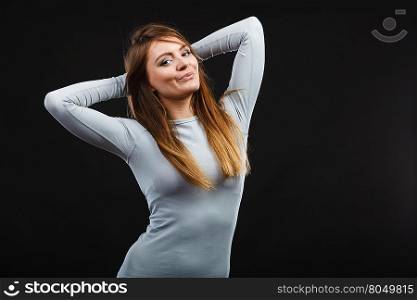 Sport fit woman in thermal clothes.. Beauty seducive shape fit body concept. Attractive girl posing. Youthful smiling lady presenting thermoactive clothing showing fitness fashion.
