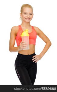 sport, fitness and diet concept - smiling sporty woman with protein shake bottle