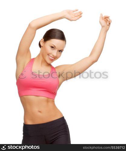sport, fitness and healthcare concept - beautiful asian sporty woman doing exercise