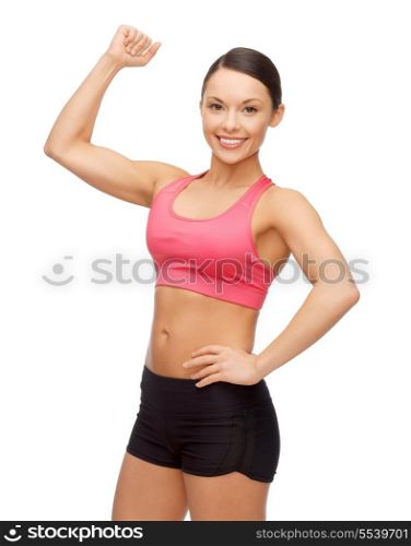 sport, fitness and healthcare concept - beautiful asian sporty woman flexing her biceps