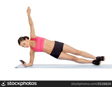sport, fitness and healthcare concept - beautiful asian sporty woman with smartphone doing exercise