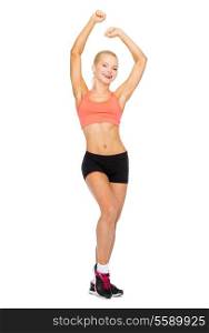 sport, fitness and healthcare concept - beautiful sporty woman dancing
