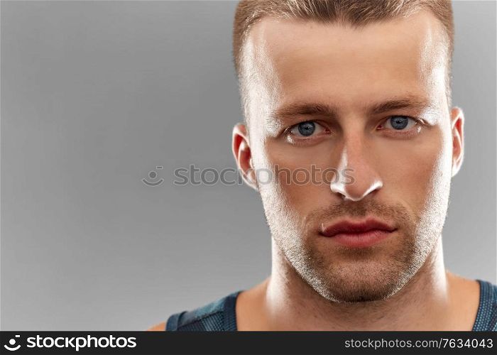 sport, fitness and people concept - portrait of young man. portrait of young man