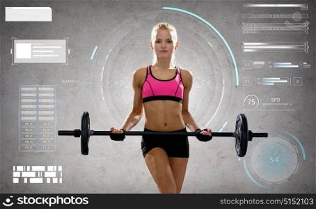 sport, fitness and people concept - young sporty woman exercising with barbell over gray background. young sporty woman exercising with barbell