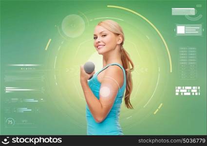 sport, fitness, exercising, technology and people concept - happy young sporty woman with dumbbell flexing biceps over green background. happy sporty woman with dumbbell flexing biceps