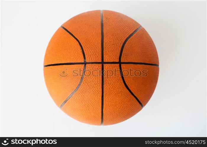 sport, fitness, game, sports equipment and objects concept -close up of basketball ball over white background