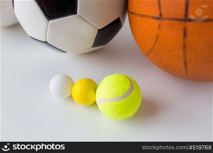 sport, fitness, game, sports equipment and objects concept - close up of different sports balls set