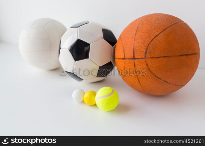 sport, fitness, game, sports equipment and objects concept - close up of different sports balls set