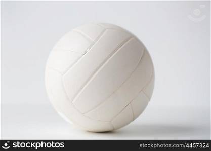 sport, fitness, game, sports equipment and objects concept - close up of volleyball ball