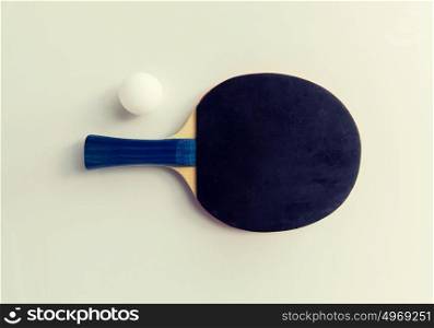 sport, fitness, healthy lifestyle and objects concept - close up of ping-pong or table tennis rackets with ball. close up of table tennis rackets with ball