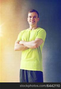 sport, fitness, lifestyle and people concept - smiling man in gym. smiling man in gym
