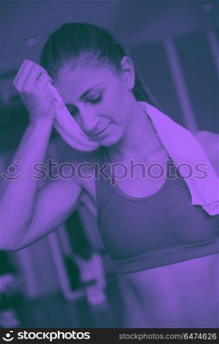 sport, fitness, lifestyle, technology and people concept - smiling woman exercising on treadmill in gym duo tone. woman exercising on treadmill in gym