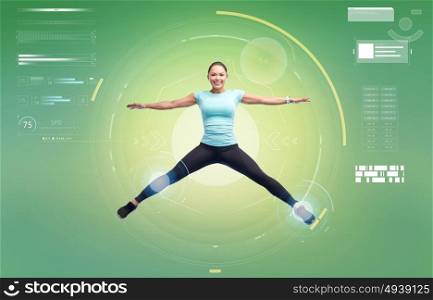 sport, fitness, motion and people concept - happy smiling young woman jumping in air over green background. happy smiling sporty young woman jumping in air