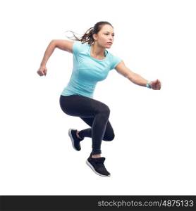 sport, fitness, motion and people concept - happy young woman jumping in air over white background
