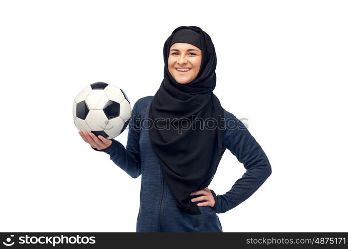 sport, fitness, soccer and people concept - happy muslim woman in hijab with football