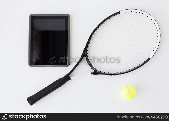 sport, fitness, sports equipment and objects concept - close up of tennis racket with ball and tablet pc computer over white background