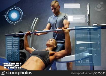 sport, fitness, teamwork, bodybuilding and people concept - young woman and personal trainer with barbell flexing muscles in gym over virtual charts. man and woman with barbell flexing muscles in gym