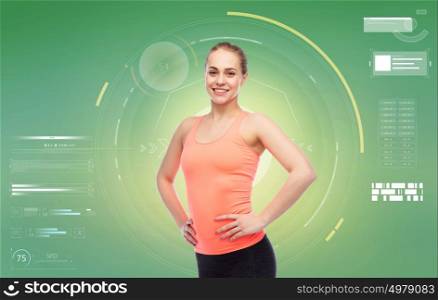 sport, fitness, technology and people concept - happy smiling sportive young woman over green background. happy smiling sportive young woman