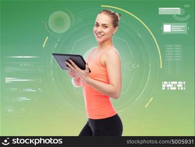 sport, fitness, technology and people concept - happy smiling sportive young woman with tablet pc computer. happy smiling sportive young woman with tablet pc