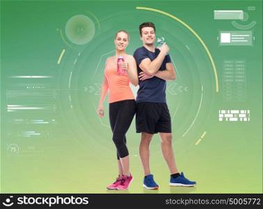 sport, fitness, technology and people concept - happy sportive man and woman with water bottles. sportive man and woman with water bottles