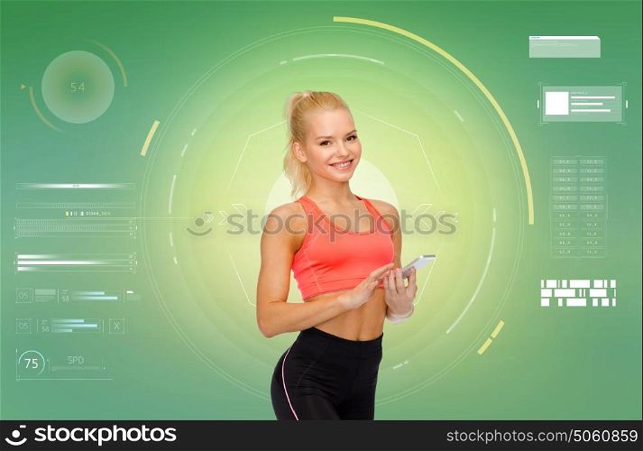 sport, fitness, technology and people concept - smiling sporty woman with smartphone over green background. smiling sporty woman with smartphone
