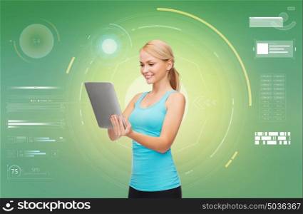 sport, fitness, technology and people - happy smiling sporty woman with tablet pc over green background. happy smiling sporty woman with tablet pc