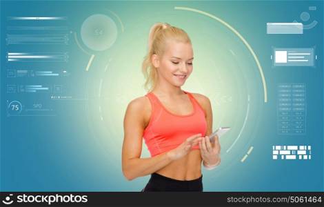 sport, fitness, technology, exercising and people concept - smiling sporty woman with smartphone over blue background. smiling sporty woman with smartphone
