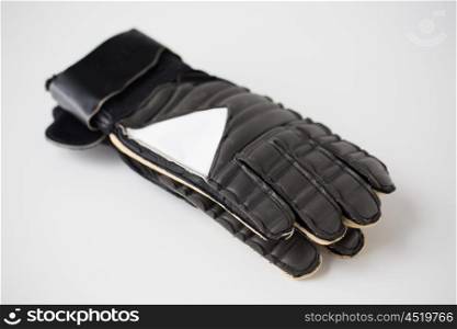 sport, football and sports equipment concept - close up of soccer goalkeeper gloves