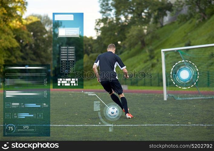 sport, football training and people - soccer player playing with ball on field. soccer player playing with ball on football field