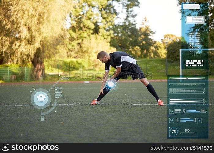 sport, football training and people - soccer player stretching leg on field. soccer player stretching leg on field football