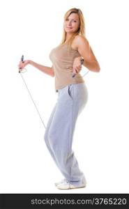 Sport girl plus size doing exercise with skip jump rope - weight loss. Fitness young woman isolated. Studio shot.