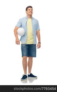 sport, leisure and people concept - smiling young man with volleyball over white background. smiling young man with volleyball