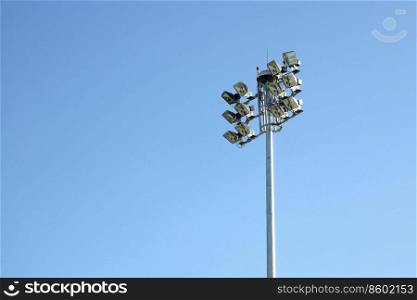 sport light post on beautiful sky background