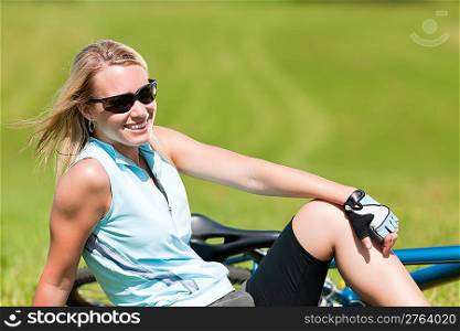 Sport mountain biking happy girl relax in meadows sunny countryside