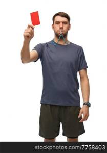 sport, refereeing and people concept - male referee whistling whistle and showing red penalty card. referee whistling whistle and showing red card