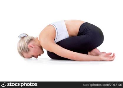 Sport Series: Young Blonde Woman doing Yoga . Childs Pose