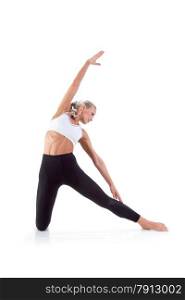 Sport Series: Young Blonde Woman doing Yoga. Gate Pose
