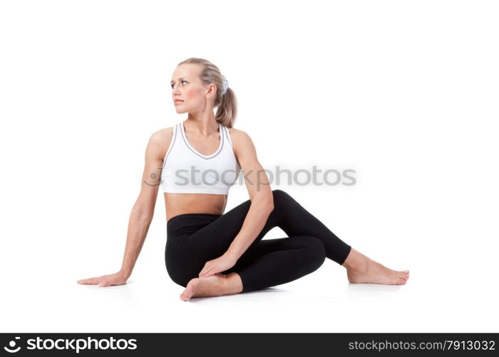 Sport Series: Young Blonde Woman doing Yoga. Sage Pose