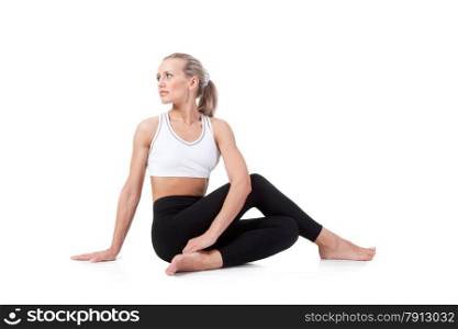 Sport Series: Young Blonde Woman doing Yoga. Sage Pose