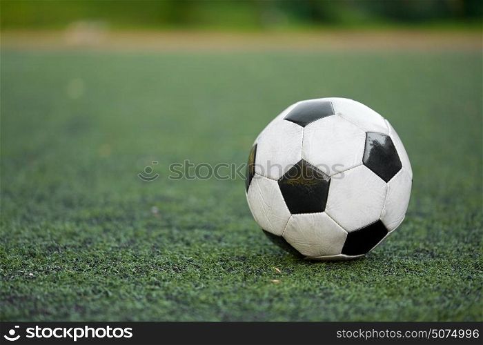 sport, soccer and game - ball on football field. soccer ball on football field