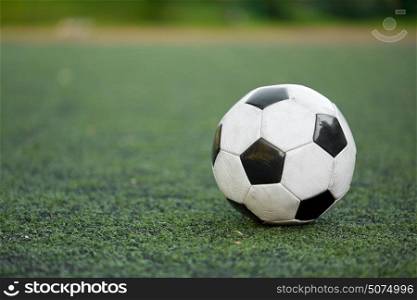 sport, soccer and game - ball on football field. soccer ball on football field