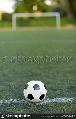 sport, soccer and game - ball on football field. soccer ball on football field marking line