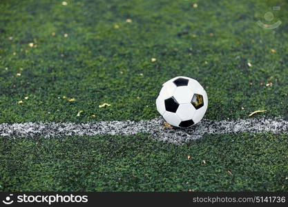 sport, soccer and game - ball on football field. soccer ball on football field marking line