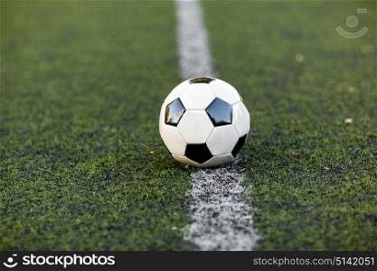 sport, soccer and game - ball on football field. soccer ball on football field marking line